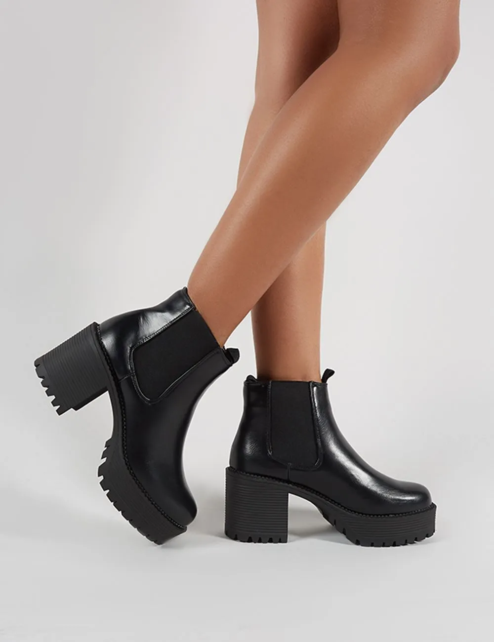 Melia Heeled Chlesea Boots in Black PU